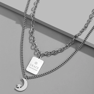 Double-layered stainless steel star and moon necklace with engraved rectangular tag
