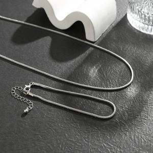 Minimalist silver square snake chain necklace set with adjustable lobster clasp detail