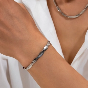 Minimalist silver twist snake chain jewelry set featuring a necklace and matching bracelet