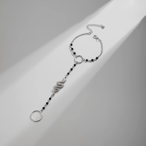 Silver snake finger bracelet with black crystals and integrated ring for men and women