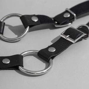 Men's adjustable black PU leather body chain with silver metal rings and punk style rivets