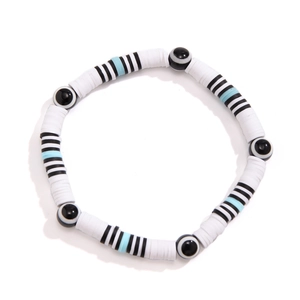 Detail of beaded evil eye bracelet with white, black and blue polymer clay heishi beads