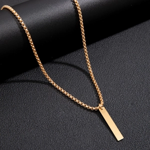Minimalist gold box chain necklace with blank rectangular pendant on black display