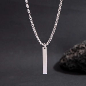 Detailed view of silver matte vertical bar pendant on high-quality box chain necklace