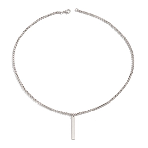 Detailed view of silver box chain necklace with minimalist rectangular metal pendant