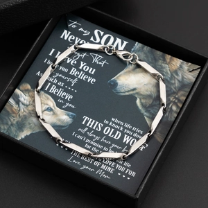 Bracelet pour homme en acier argenté dans une boîte cadeau avec carte de loup