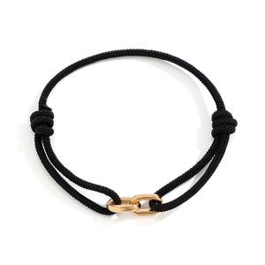 Men's minimalist black braided Milan cord bracelet with interlocking gold metal buckles