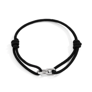 Close-up of black braided Milan rope bracelet with silver double interlocking metal buckles
