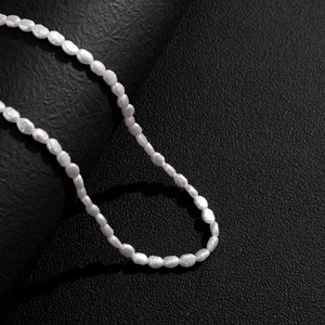 Elegant baroque irregular pearl necklace with natural white rice-shaped pearls for men
