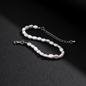 Men's baroque pearl bracelet with irregular natural white pearls and silver lobster clasp