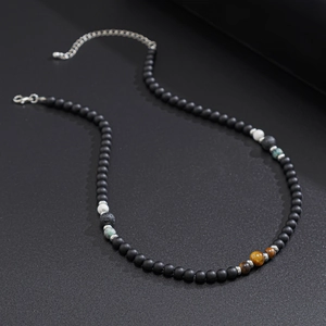 Handmade beaded necklace with black matte beads and natural stone accents for men and women