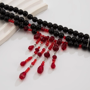 Collier homme vintage à perles noires multicouches avec breloques de gland goutte de sang