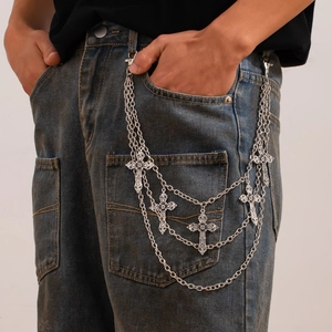 Close-up of triple-layered silver hip-hop pants chain with hollow cross pendants
