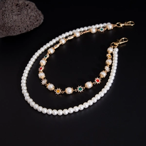 Men's hip hop pants chain with layered faux pearls, gold floral accents and colorful stones