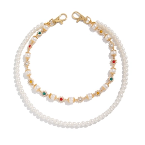 Double-layered pearl pant chain with colorful rhinestones and gold lobster clasps