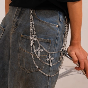 Men's multi-layer silver pants chain with gothic cross pendants on blue jeans