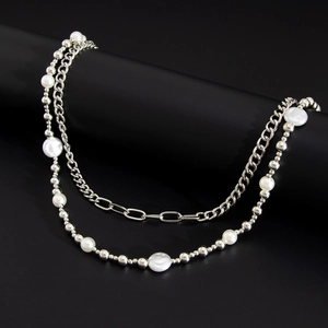 Hip hop style trousers chain featuring silver metal links and assorted white pearls