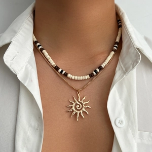 Mens beach style layered necklace with coconut beads and golden sun charm pendant