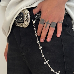 Mens hip hop cross pant chain with rhinestones paired with a studded leather belt