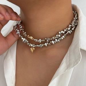 Men's double-layered irregular silver bead necklace with a golden heart pendant