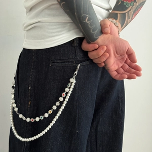 Close-up of hip hop double-layer trouser chain with pearls and rhinestone balls