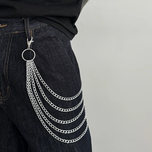 Multi-layer silver metal pants chain with spring clasp on blue denim jeans for men
