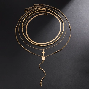 Men's 4-piece gold layered necklace set with cross pendant and flat snake chains
