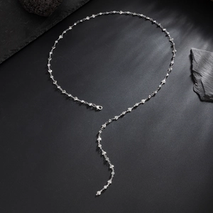 Silver Y-shaped heart necklace for men with sparkling zircon accents on black background