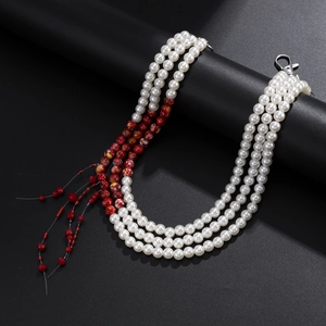 Bohemian triple-layer beaded pant chain with white pearls and red tassel detail