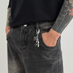Vintage star dice keychain pants chain with D20 dice on black denim jeans