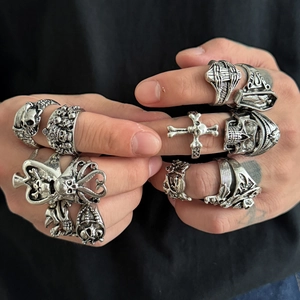 Gothic punk silver skull and cross ring set for men featuring a vintage oxidized finish