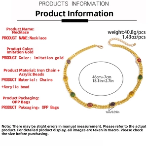 Detail of chunky gold chain necklace featuring colorful acrylic gems with size dimensions