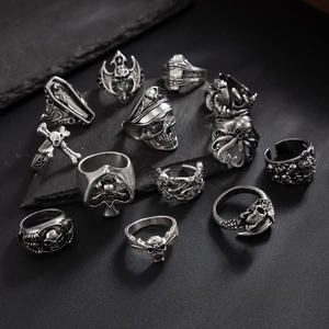 Gothic punk ring set for men featuring skull and cross motifs in vintage silver finish