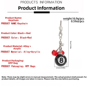 Detail view of billiard 8-ball and cherry keychain showing dimensions and material specs