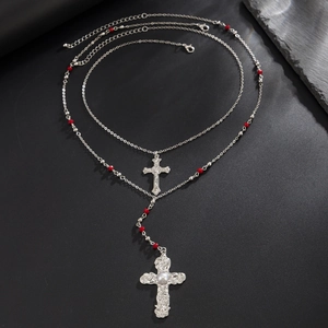 Silver double-layered rosary necklace with red beads and faux pearl cross pendant