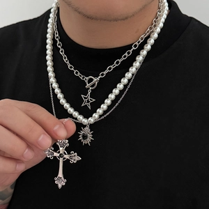 Three-layer layered necklace featuring pearl chain, gothic cross, heart and star pendants