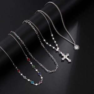Set of silver hip-hop necklaces with cross, sun pendant, faux pearls and colorful gems