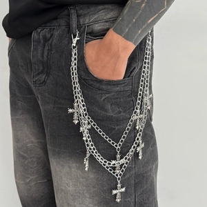 Men's multi-layered silver metal wallet chain featuring vintage cross charms and feather detail