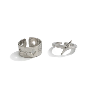 Minimalist silver star rings featuring polished wide band and slim star-shaped design