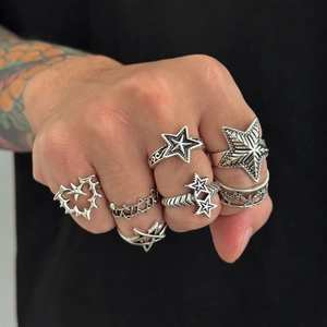 Men's hip-hop gothic silver ring set with thorn heart and star designs on hand