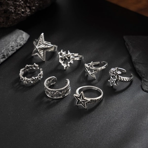 7-piece vintage silver gothic ring set featuring star and heart designs in retro punk style