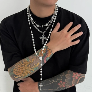 Mens hip hop layered necklace set with pearls and silver cross pendants on black tee