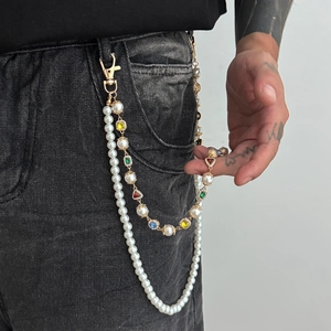 Hip-hop double-layer pant chain with pearls and multi-colored crystals on black jeans