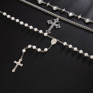 Detailed view of silver hip-hop pearl necklace with cross pendant and metal chains