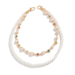 Chaîne de jean en perles et fleurs en strass avec fermoir mousqueton doré pour hommes