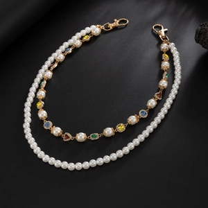 Detail of hip-hop pants chain featuring double-layer pearls and colorful rhinestones