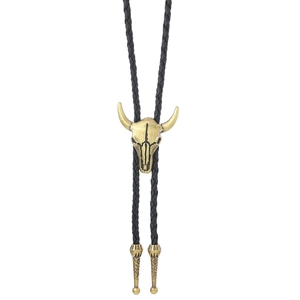 Vintage western bolo tie featuring an antique gold bull skull pendant on black braided PU cord