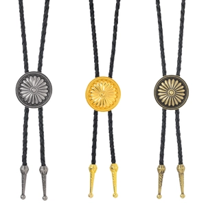 Three vintage Western bolo ties featuring floral engraved metal slides and black braided cords