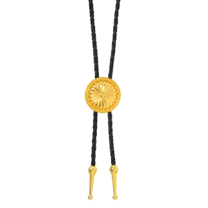 Classic American Western bolo tie with golden sunburst pendant and black braided rope