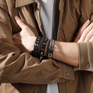 Punk style leather bracelets set for men and women featuring metal studs and spikes